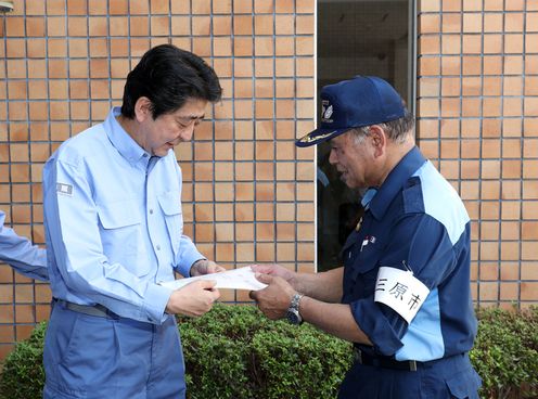 Photograph of the Prime Minister receiving the request