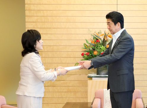 Photograph of the Prime Minister receiving the NPA Recommendation and other documents