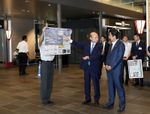 Photograph of the Prime Minister receiving an explanation at Toyama Station
