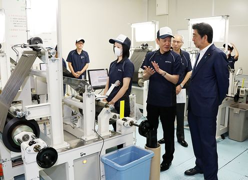 Photograph of the Prime Minister visiting a company