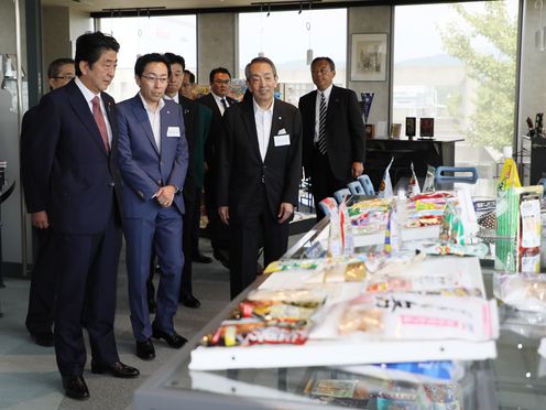 Photograph of the Prime Minister visiting a company