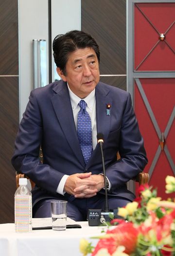 Photograph of the Prime Minister attending the meeting