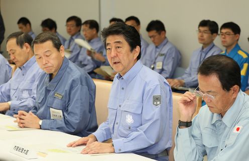 Photograph of the Prime Minister attending the meeting of the Extreme Disaster Management Headquarters