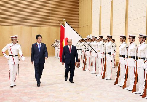 Photograph of the salute and the guard of honor ceremony