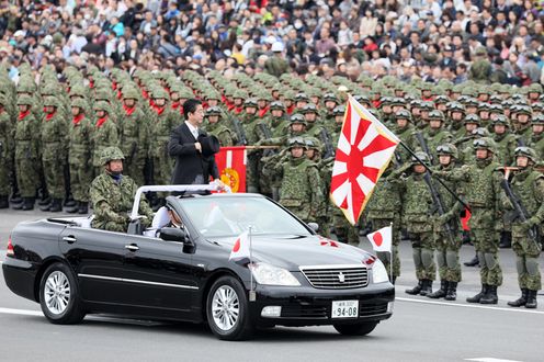 Photograph of the Prime Minister reviewing units