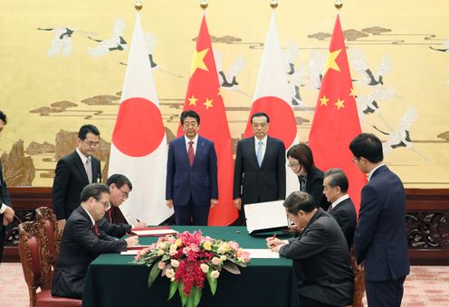 Photograph of the leaders attending the signing ceremony