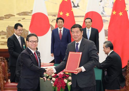 Photograph of the leaders attending the signing ceremony