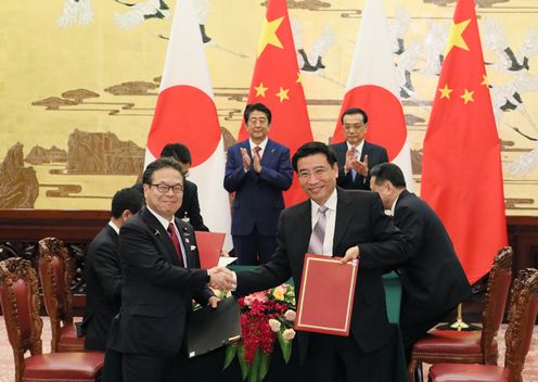 Photograph of the leaders attending the signing ceremony