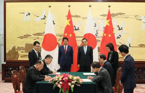 Photograph of the leaders attending the signing ceremony