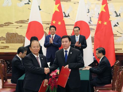 Photograph of the leaders attending the signing ceremony