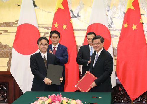 Photograph of the leaders attending the signing ceremony