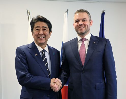 Photograph of the Prime Minister shaking hands with the Prime Minister of Slovakia
