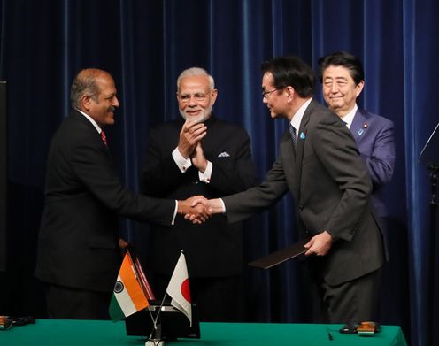 Photograph of the ceremony for signing and exchange of documents