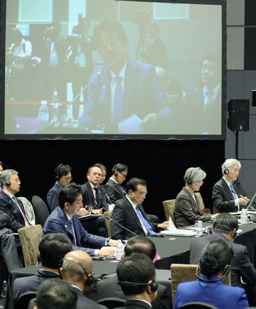 Photograph of the Prime Minister making a statement at the ASEAN Plus Three Summit Meeting
