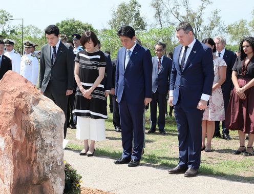 Photograph of the Prime Minister observing a moment of silence
