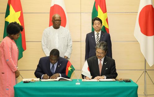 Photograph of the leaders attending the signing ceremony