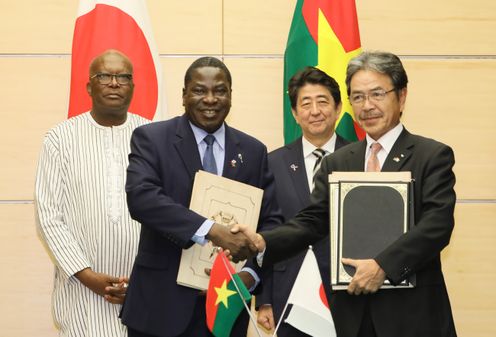 Photograph of the leaders attending the signing ceremony