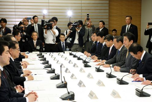 Photograph of the Prime Minister attending the meeting