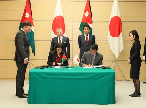 Photograph of the leaders attending the signing ceremony