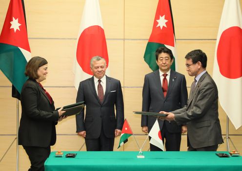 Photograph of the leaders attending the signing ceremony