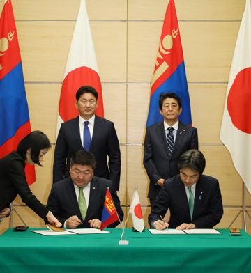 Photograph of the leaders attending the signing ceremony