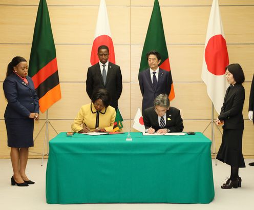 Photograph of the leaders attending the signing ceremony