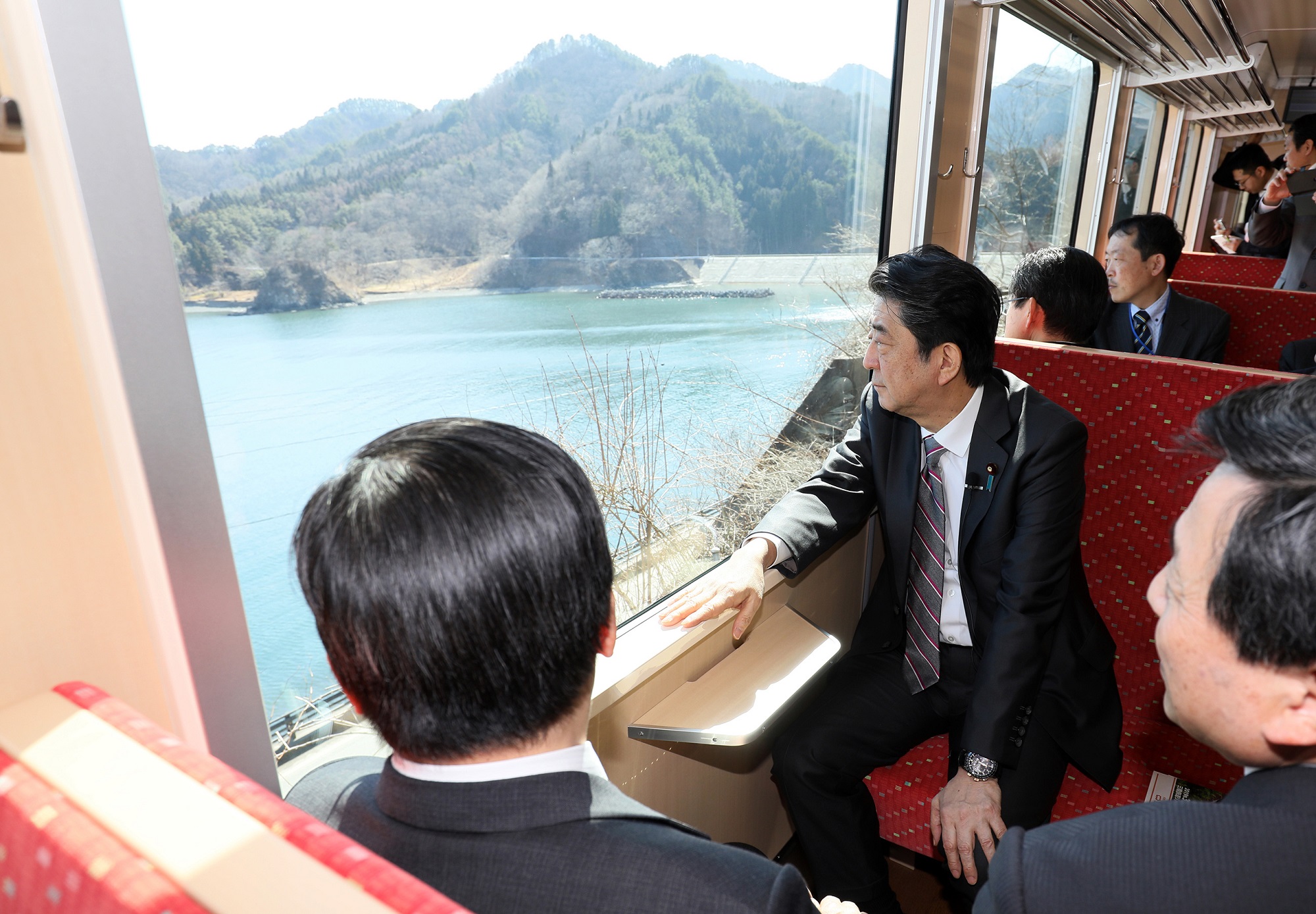 Photograph of the Prime Minister observing the train car trial run