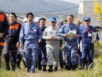 Photograph of the Prime Minister visiting a site affected by the flooding in Motomiya City, Fukushima Prefecture