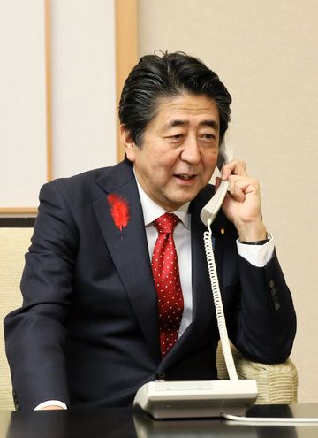 Photograph of the Prime Minister making the congratulatory telephone call