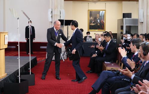 Photograph of the Prime Minister heading to the podium for a keynote speech