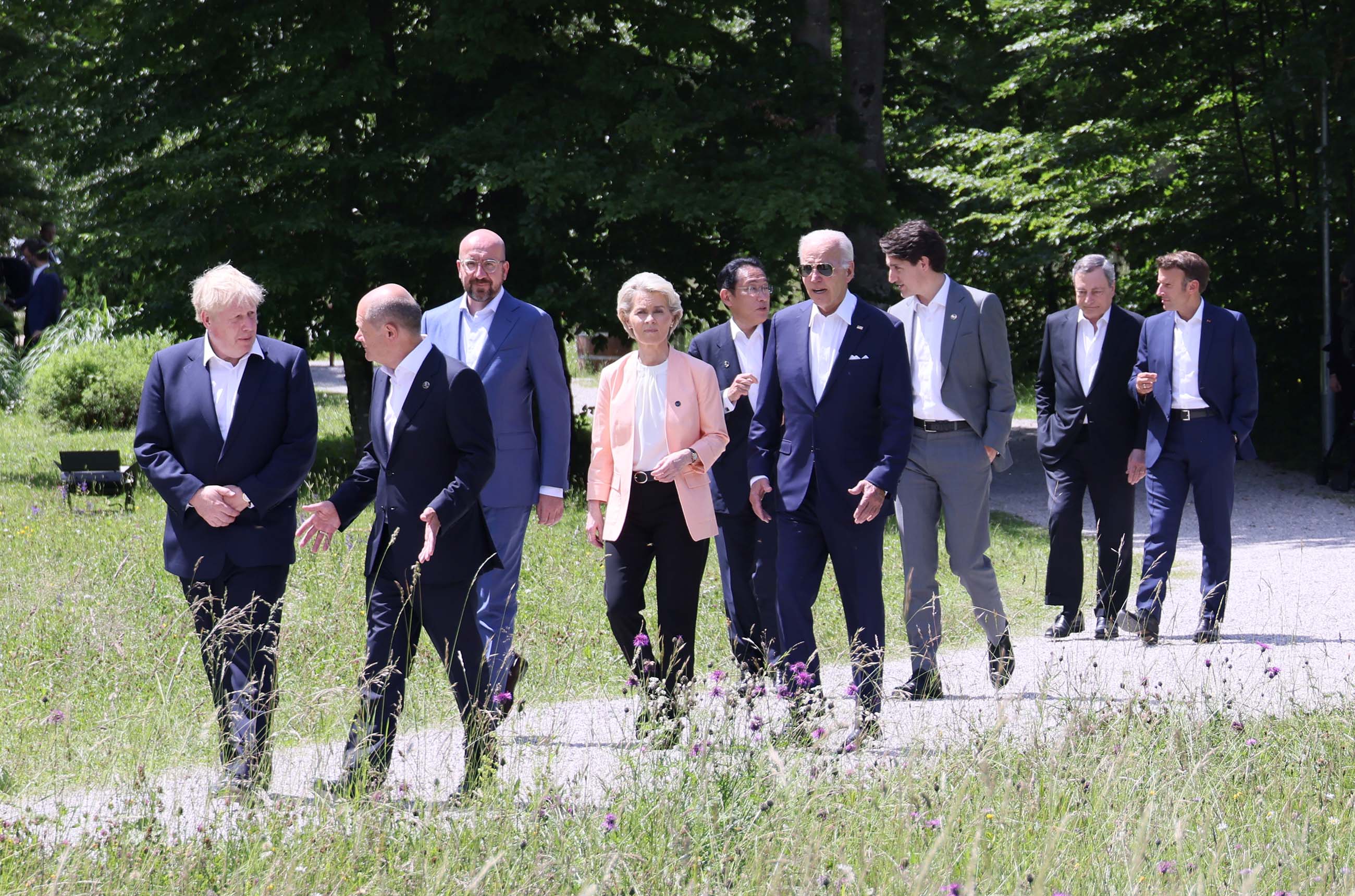 Photograph of the leaders heading to a group photo session