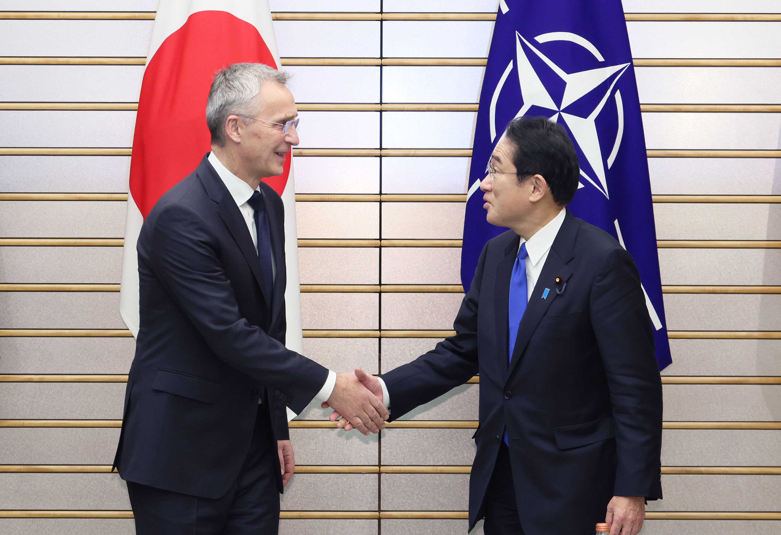 Prime Minister Kishida shaking hands with NATO Secretary General (2)