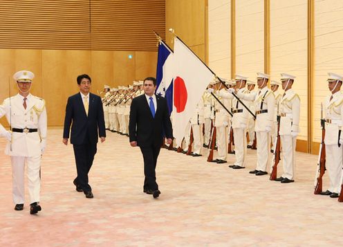 Photograph of the ceremony by the guard of honor