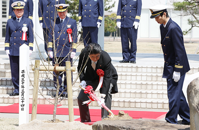 Photograph of the Prime Minister planting a commemorative tree