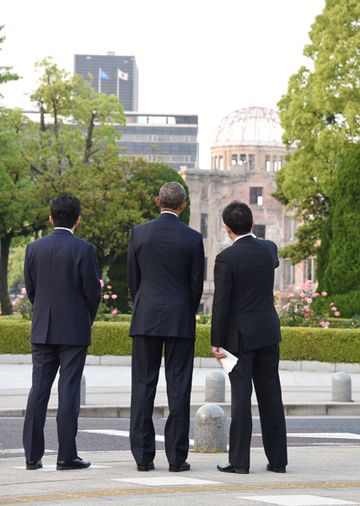 Photograph of the leaders viewing the Atomic Bomb Dome