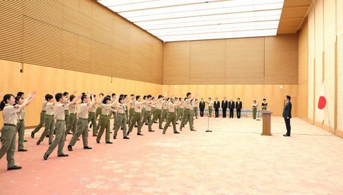 Photograph of the Prime Minister being given the traditional scout cheers of “Iyasaka”