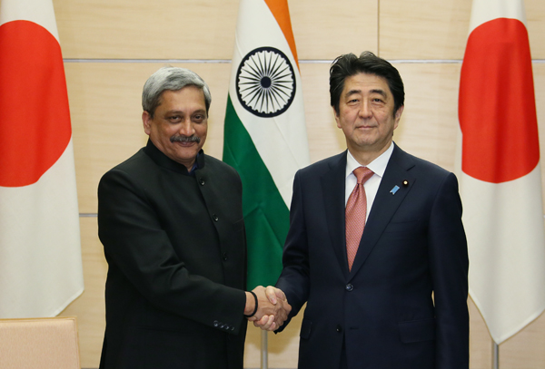 Photograph of the Prime Minister shaking hands with the Defense Minister of India
