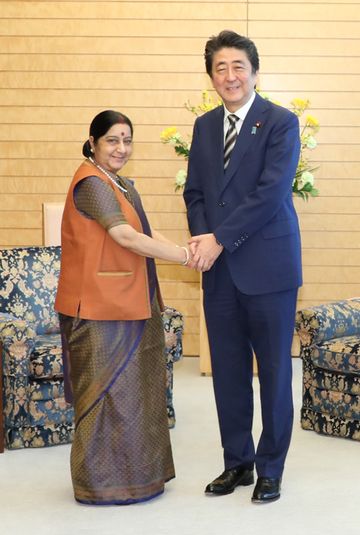 Photograph of the Prime Minister shaking hands with the Minister of External Affairs of India