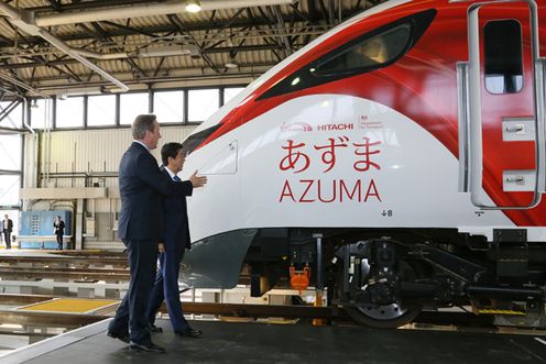 Photograph of the leaders touring a Japanese company