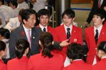 Photograph of the Prime Minister conversing with athletes (1)