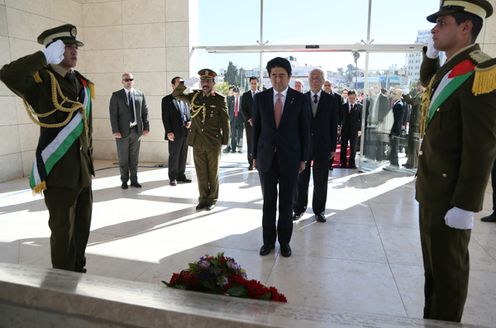 Photograph of the Prime Minister visiting the Mausoleum of Yasser Arafat and offering flowers