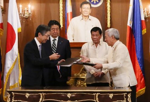 Photograph of the leaders attending the signing ceremony (1)