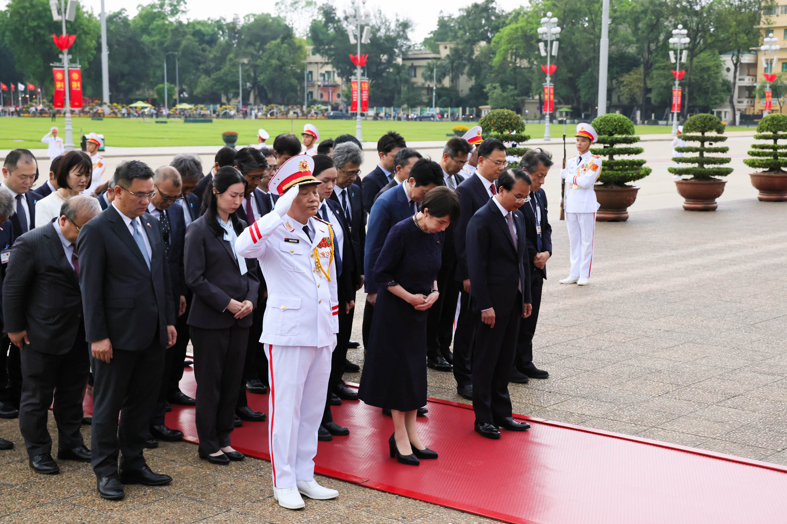 Prime Minister Takaichi paying her respects at the Ho Chi Minh Mausoleum