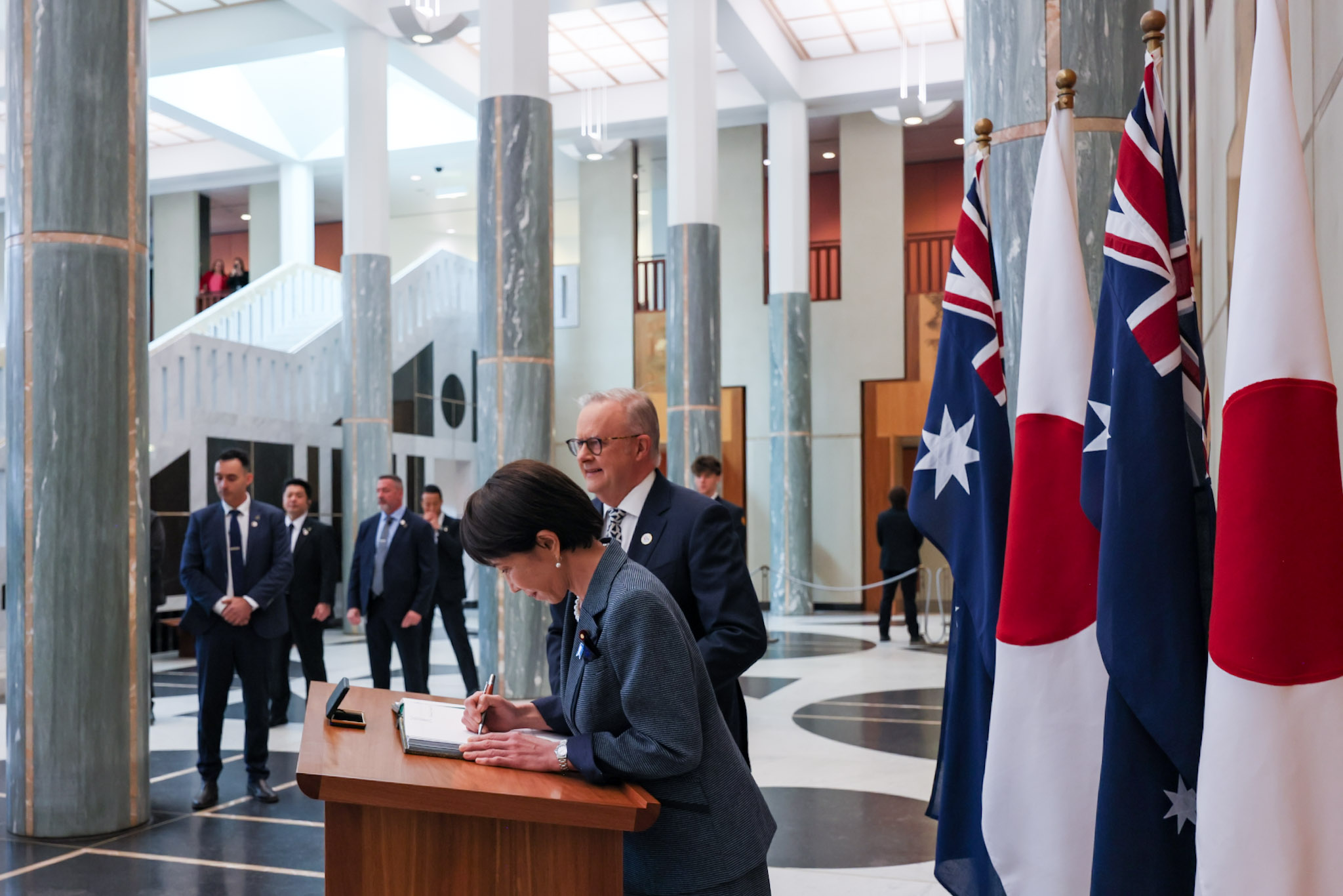 Prime Minister Takaichi signing the Guest Book (3)