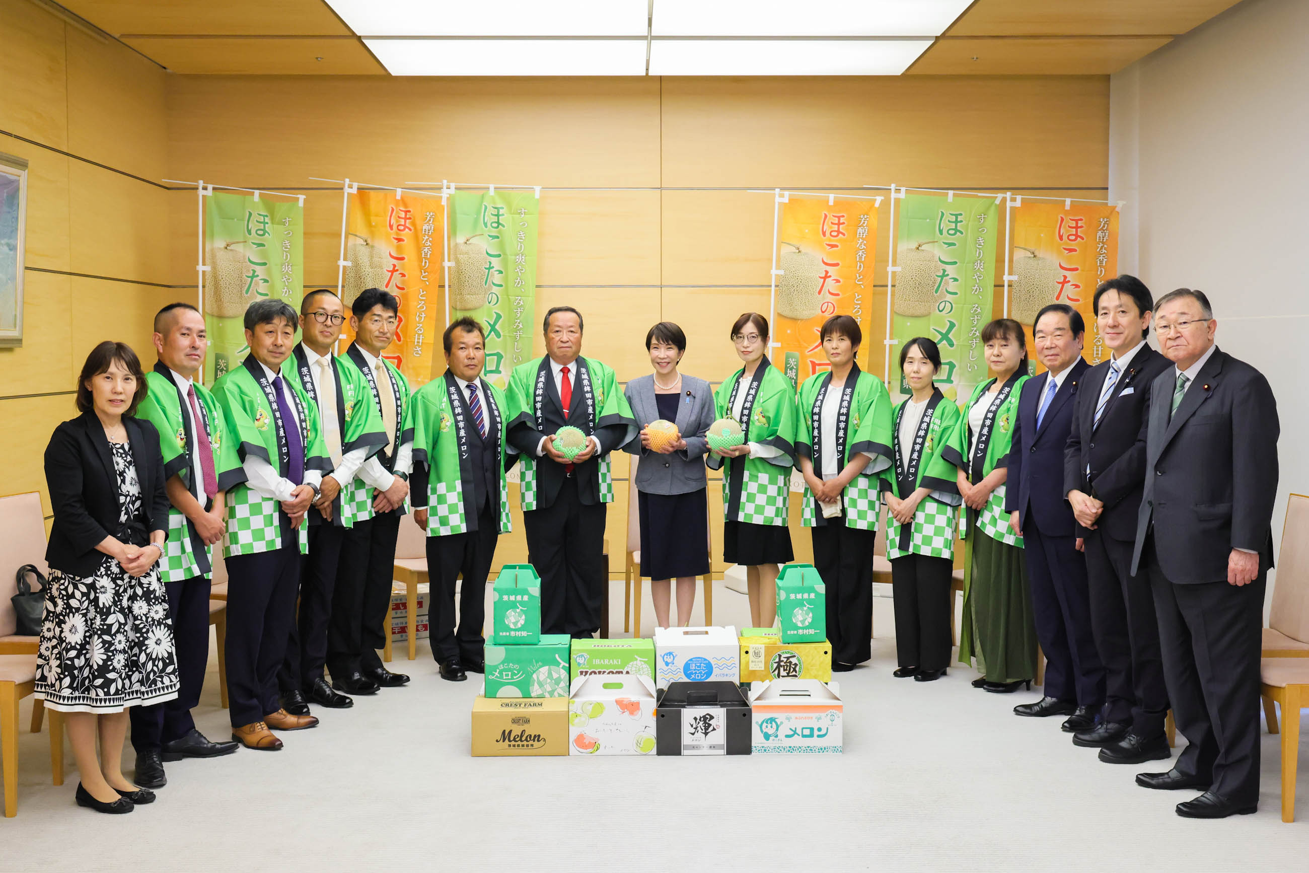 Prime Minister Takaichi being presented with melons (1)