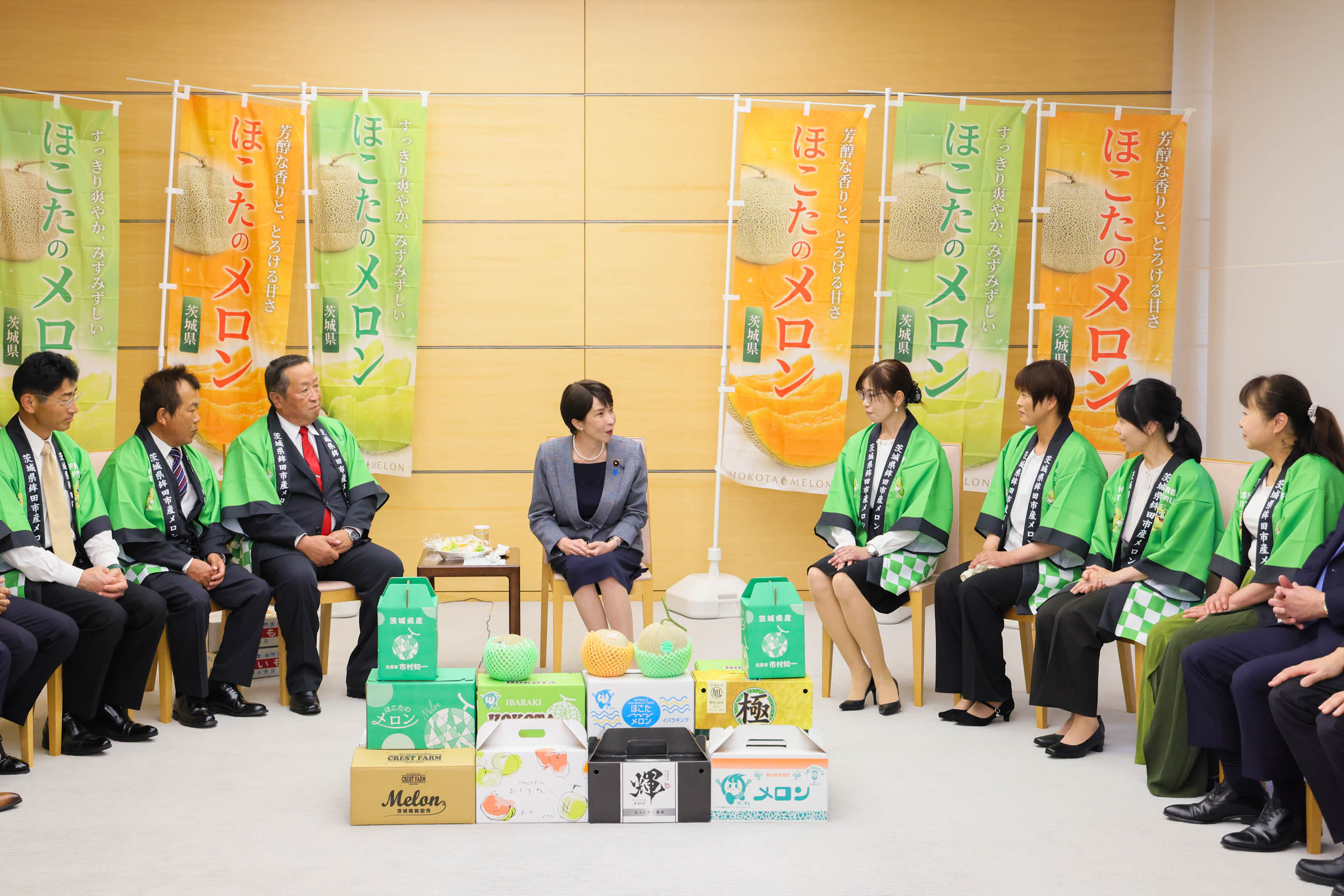 Prime Minister Takaichi being presented with melons (4)