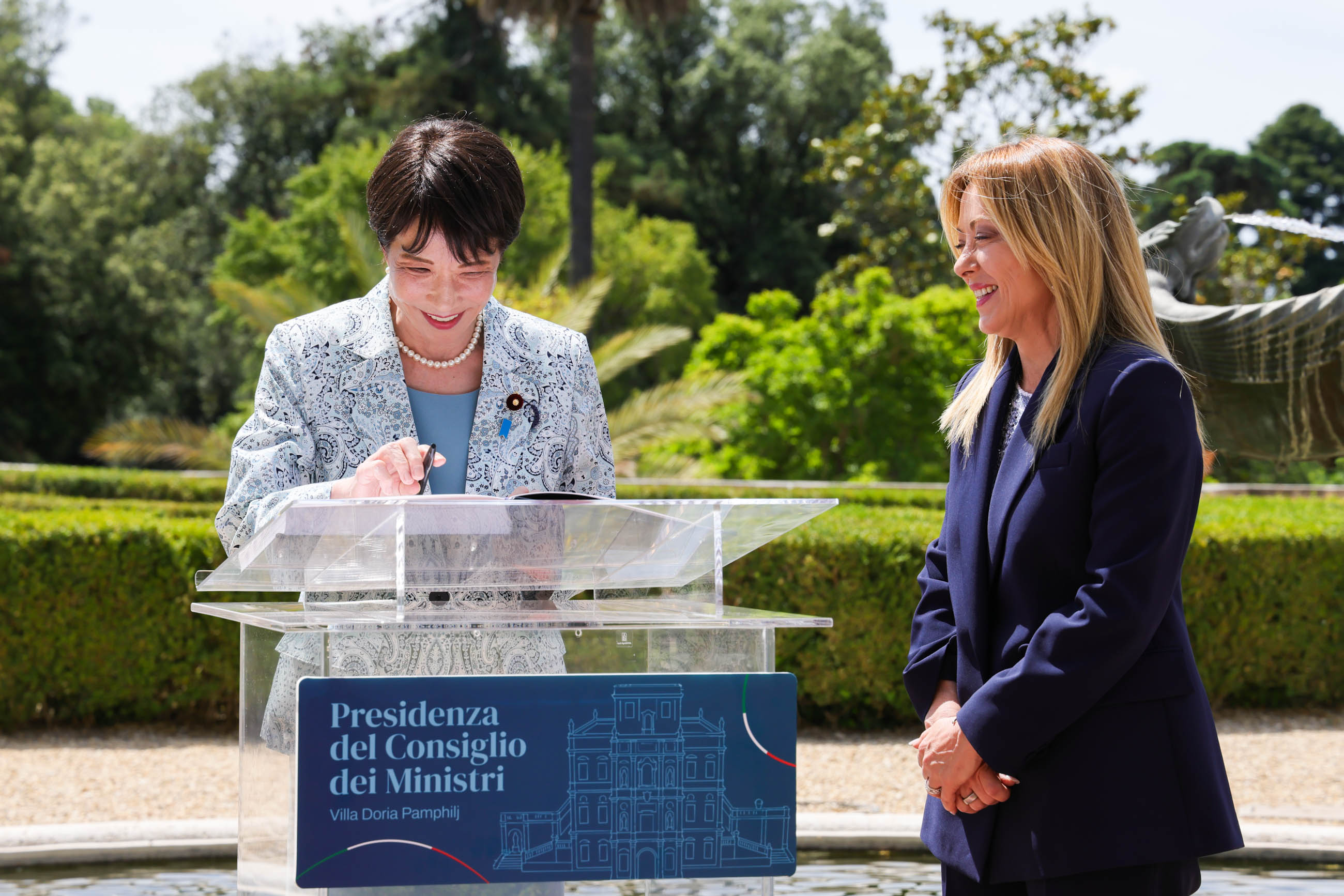 Prime Minister Takaichi Signing the Guest Book 2