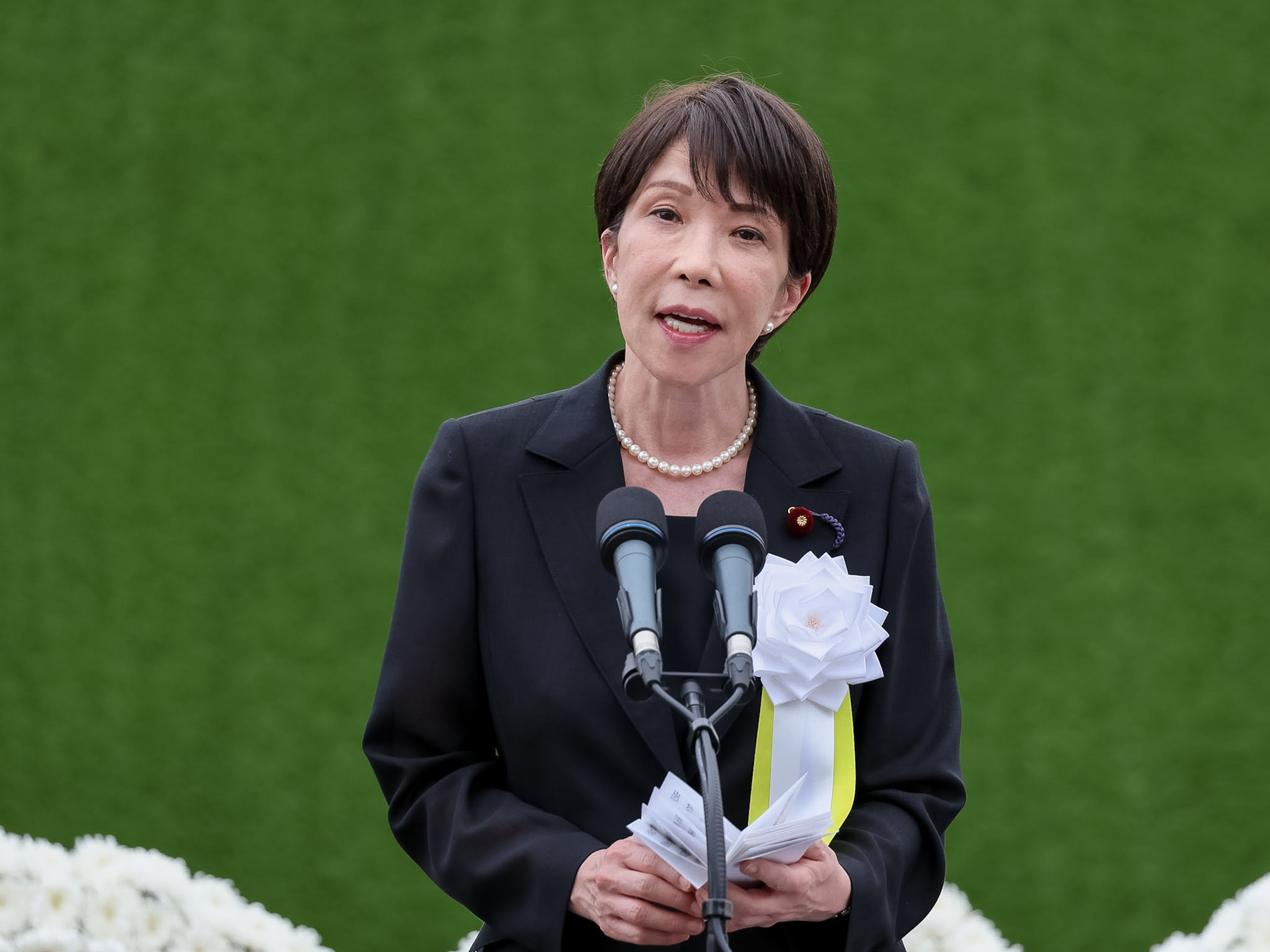 Prime Minister TAKAICHI delivering an address (1)
