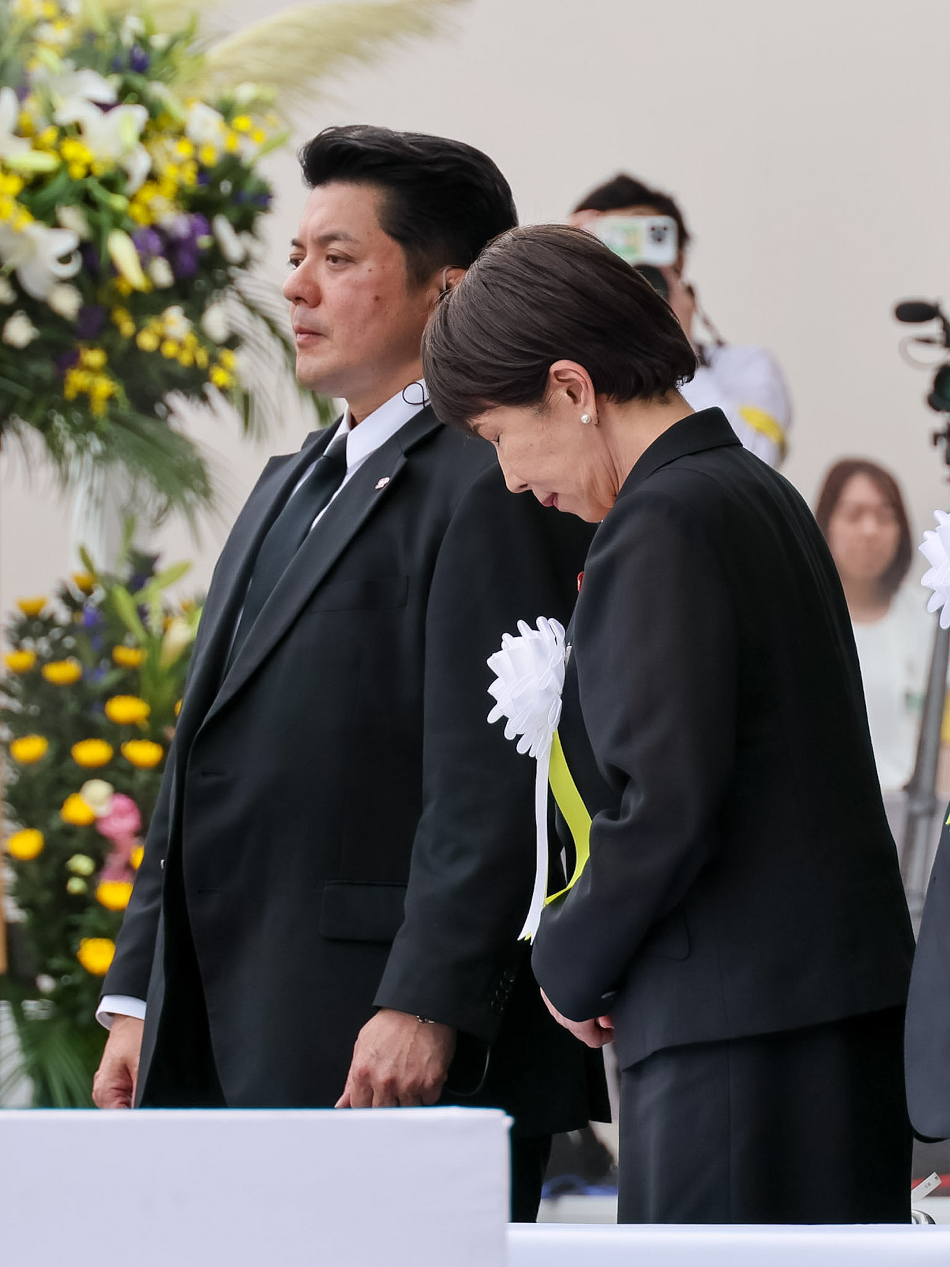 Prime Minister TAKAICHI observing a moment of silence (1)