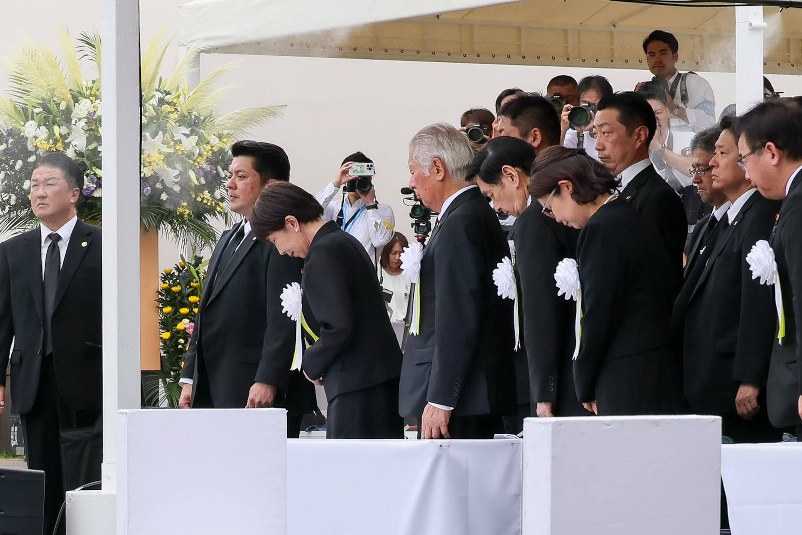 Prime Minister TAKAICHI observing a moment of silence (2)